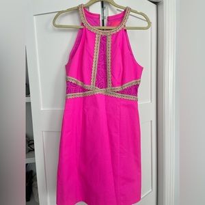 Lilly Pulitzer Bright Pink Dress with gold and lace detail.